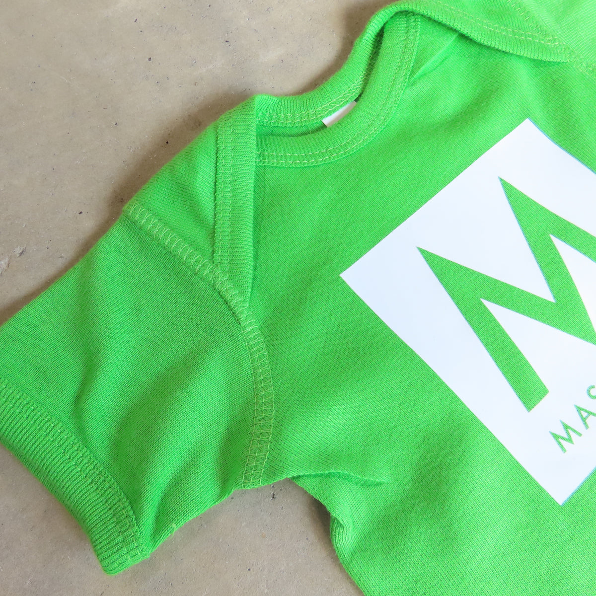 MASS MoCA Baby Romper: Apple Green