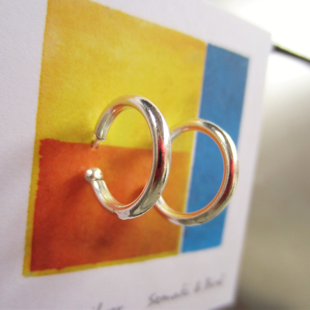 Abstract Studs: Silver Hoops